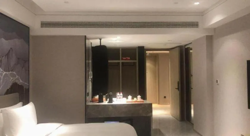 Bed in Yinhu Junyi Hotel（Wildlife Park）