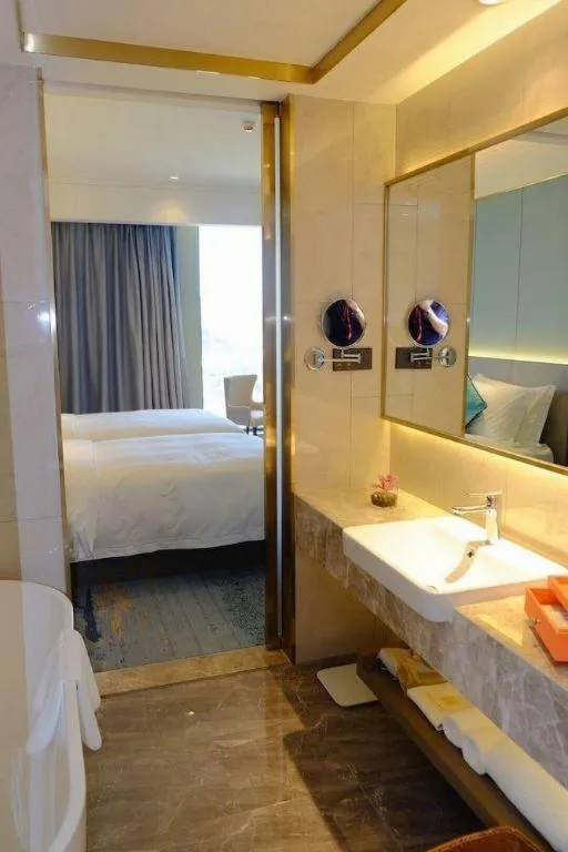 Bed in Yinhu Junyi Hotel（Wildlife Park）