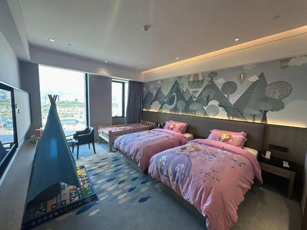 Bed in Yinhu Junyi Hotel（Wildlife Park）