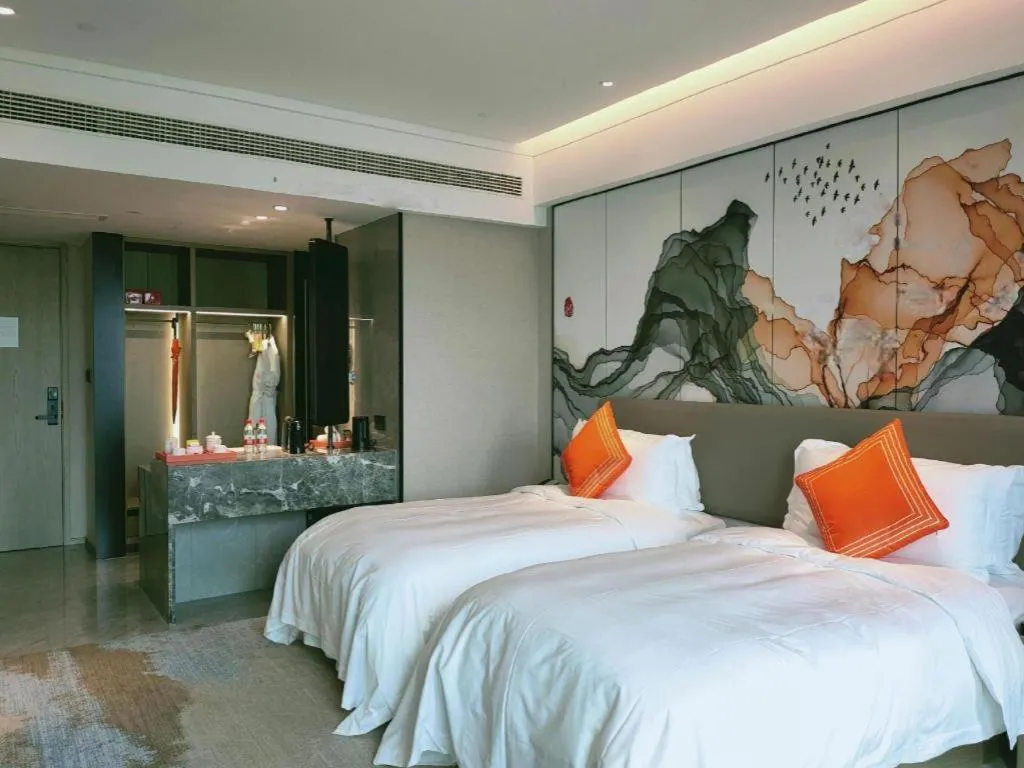 Bed in Yinhu Junyi Hotel（Wildlife Park）