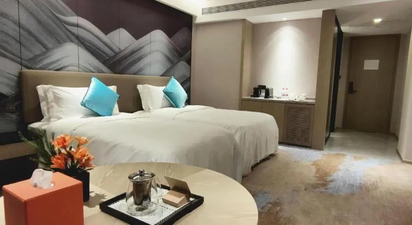 Bed in Yinhu Junyi Hotel（Wildlife Park）