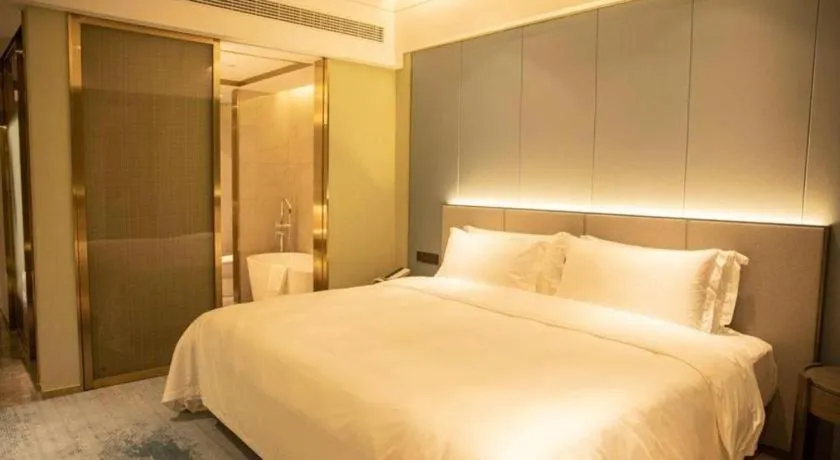 Bed in Yinhu Junyi Hotel（Wildlife Park）