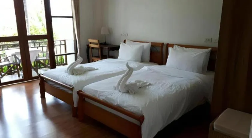 Bed in Gin's Greenery Resort