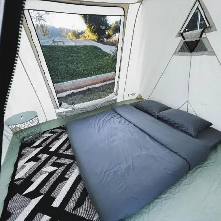 Bed in THUNWA the CAMPSITE Bed in THUNWA the CAMPSITE