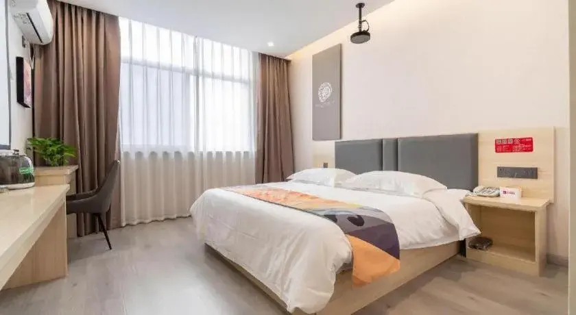 Bed in Shell Hotel Wuxi Huishan District Chang'an Town Bed in Shell Hotel Wuxi Huishan District Chang'an Town