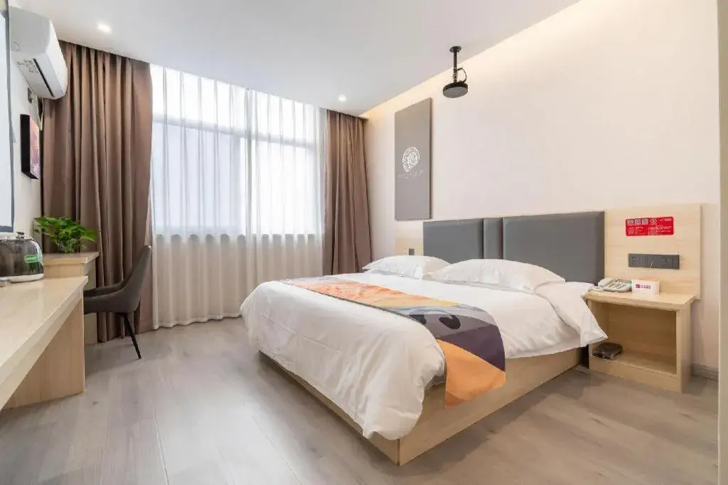 Bed in Shell Hotel Wuxi Huishan District Chang'an Town Bed in Shell Hotel Wuxi Huishan District Chang'an Town