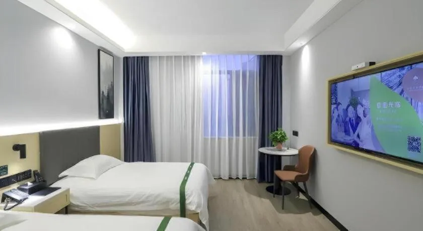 Bed in GreenTree Inn Express Fuyang University Town West High-Speed Railway Station
