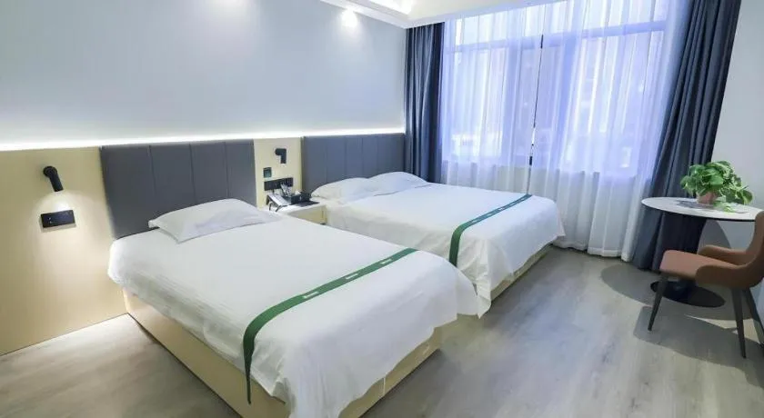 Bed in GreenTree Inn Express Fuyang University Town West High-Speed Railway Station