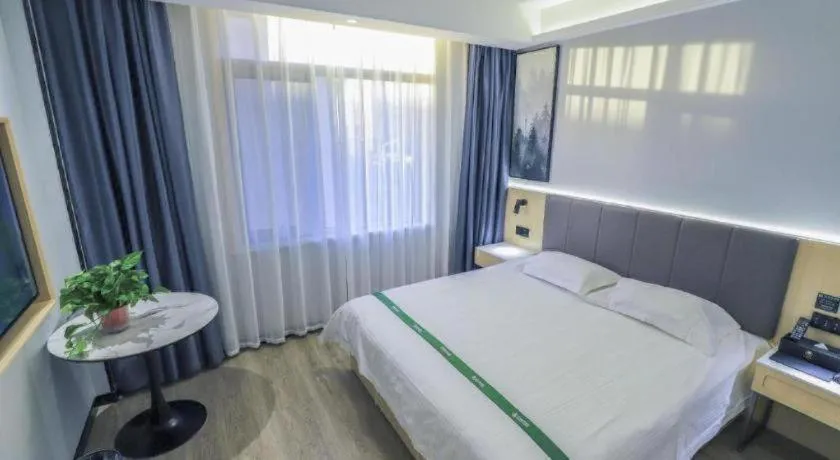 Bed in GreenTree Inn Express Fuyang University Town West High-Speed Railway Station