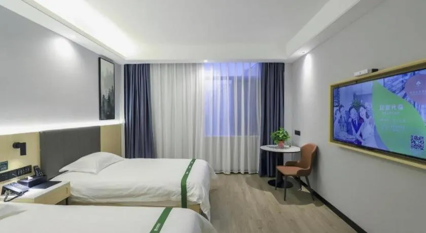 Bed in GreenTree Inn Express Fuyang University Town West High-Speed Railway Station