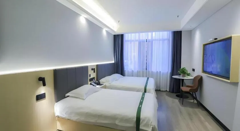 Bed in GreenTree Inn Express Fuyang University Town West High-Speed Railway Station