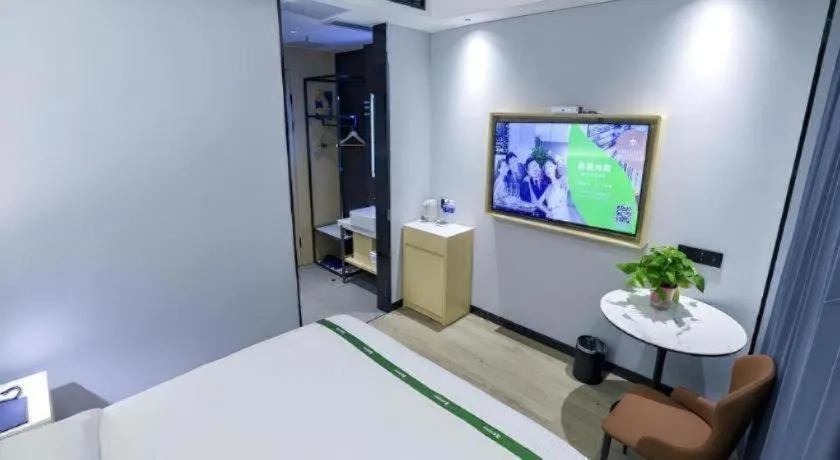 Bed in GreenTree Inn Express Fuyang University Town West High-Speed Railway Station