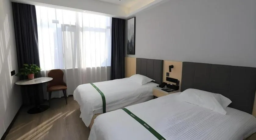 Bed in GreenTree Inn Express Fuyang University Town West High-Speed Railway Station