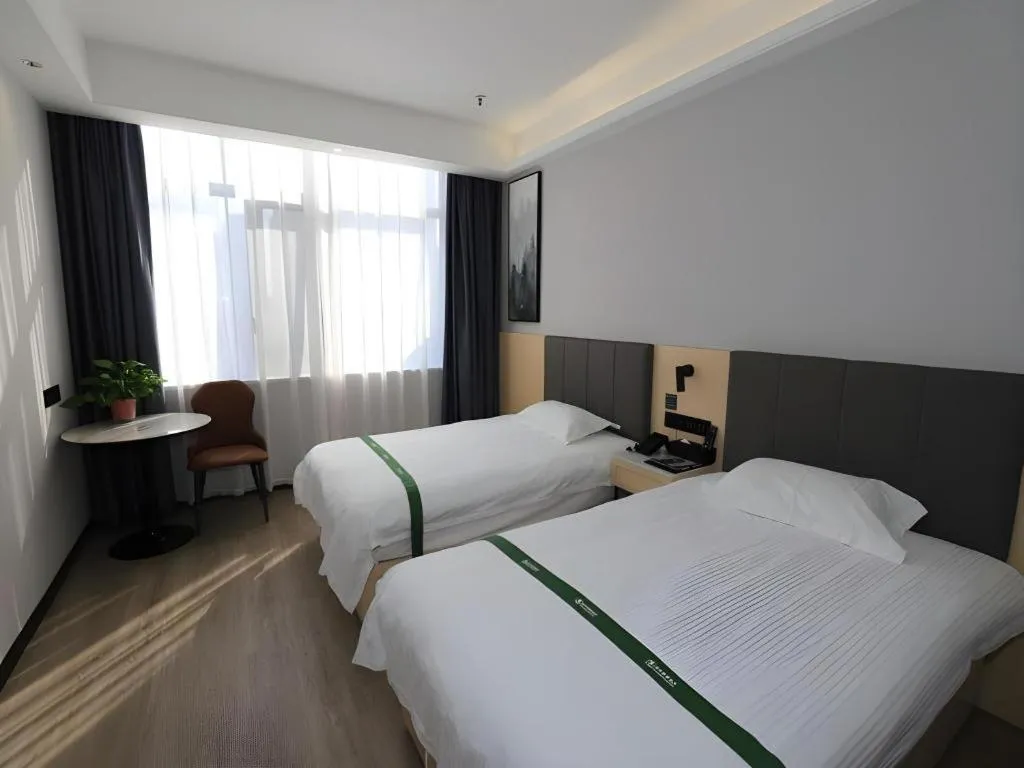 Bed in GreenTree Inn Express Fuyang University Town West High-Speed Railway Station
