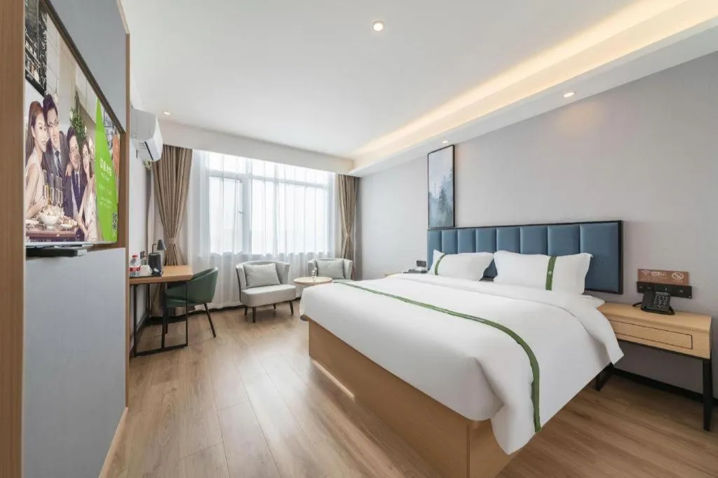 Bed in GreenTree Inn Express Qingdao Jiaodong International Airport