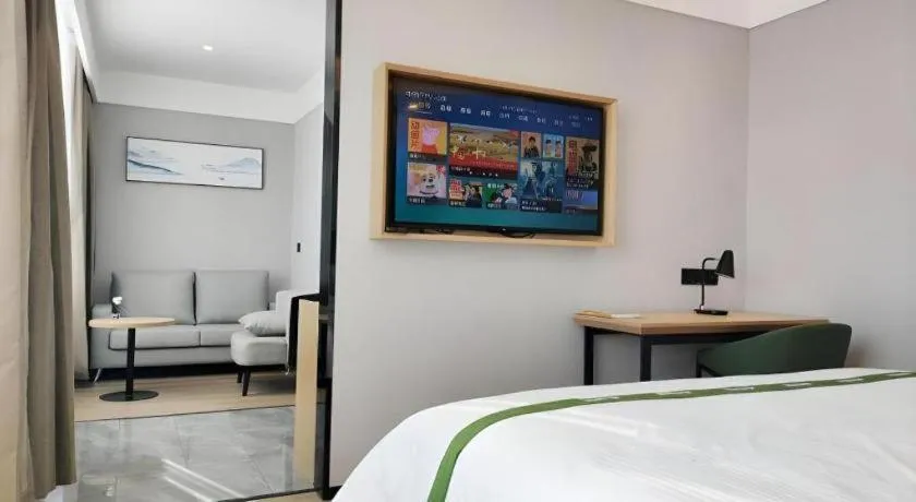 Bed in GreenTree Inn Express Qingdao Jiaodong International Airport