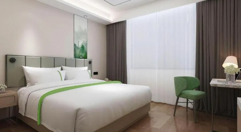 Bed in GreenTree Inn Express Qingdao Jiaodong International Airport
