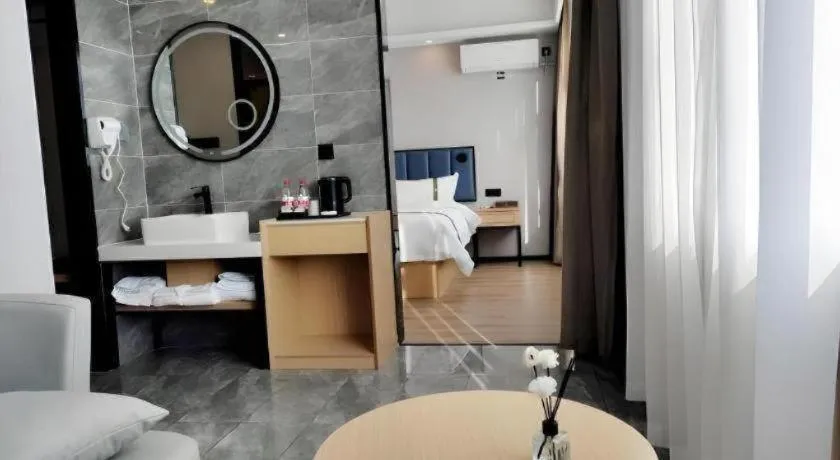 Bed in GreenTree Inn Express Qingdao Jiaodong International Airport