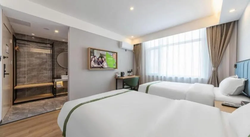 Bed in GreenTree Inn Express Qingdao Jiaodong International Airport