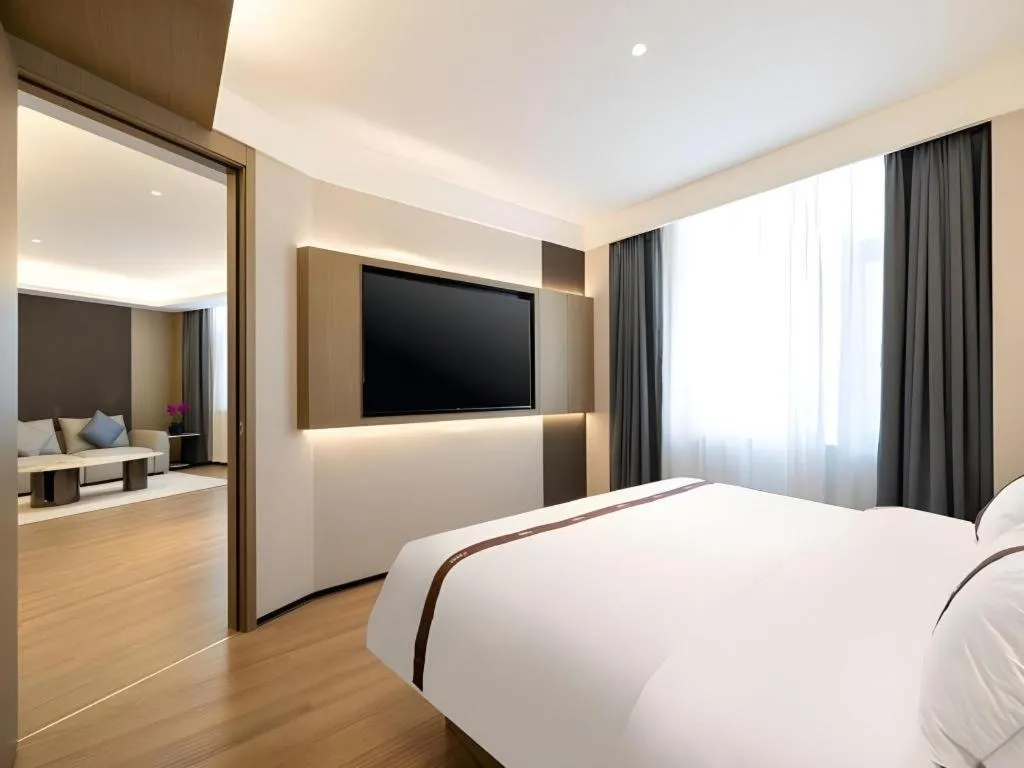 Bed in GYA Hotel Taiyuan Jinyang Street Grand Shanxi Hospital