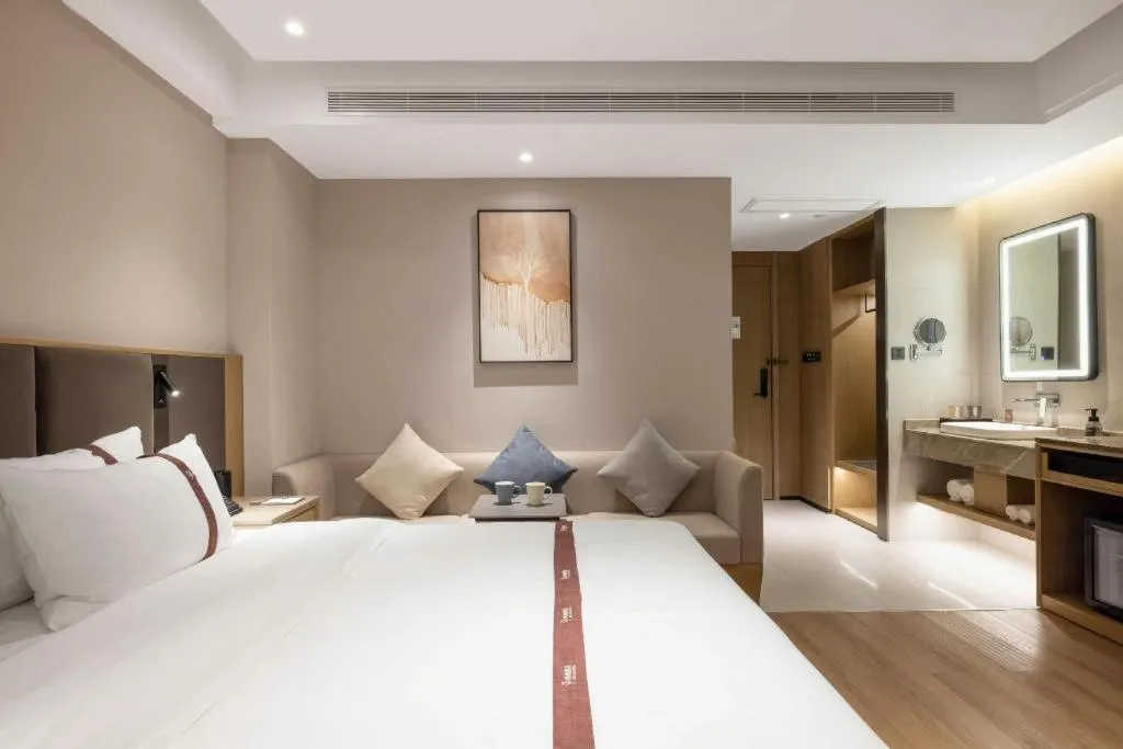 Bed in GYA Hotel Taiyuan Jinyang Street Grand Shanxi Hospital