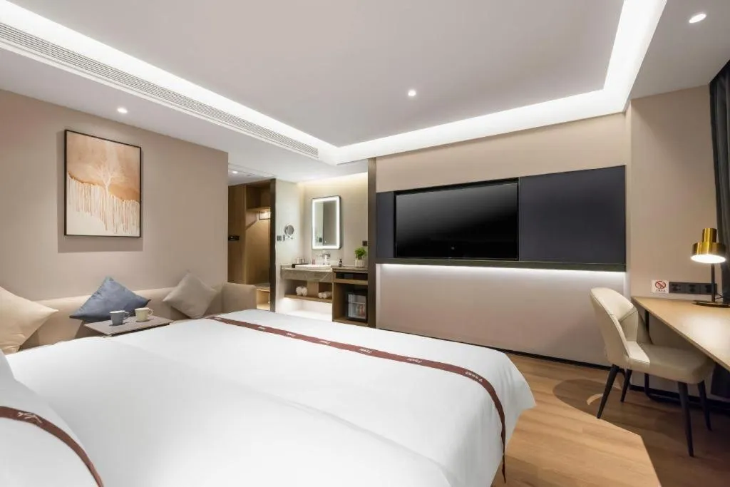 Bed in GYA Hotel Taiyuan Jinyang Street Grand Shanxi Hospital