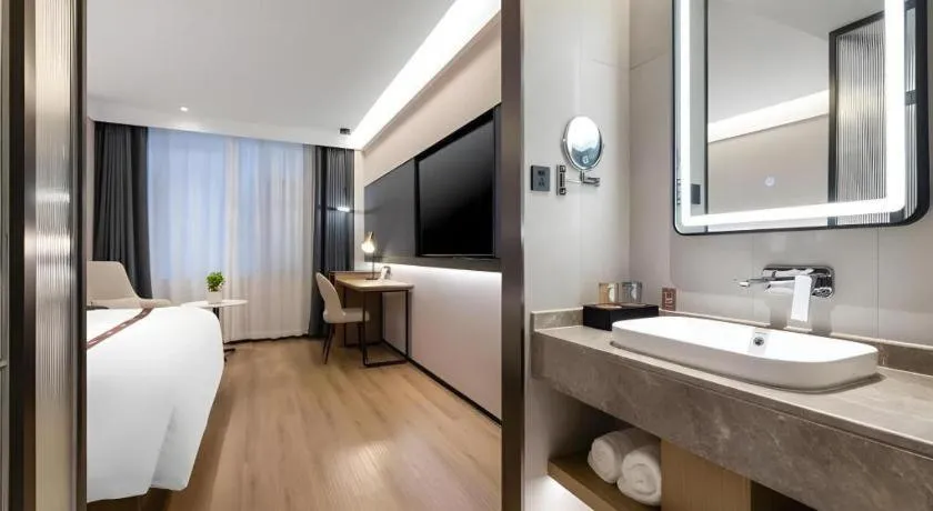 Bed in GYA Hotel Taiyuan Jinyang Street Grand Shanxi Hospital