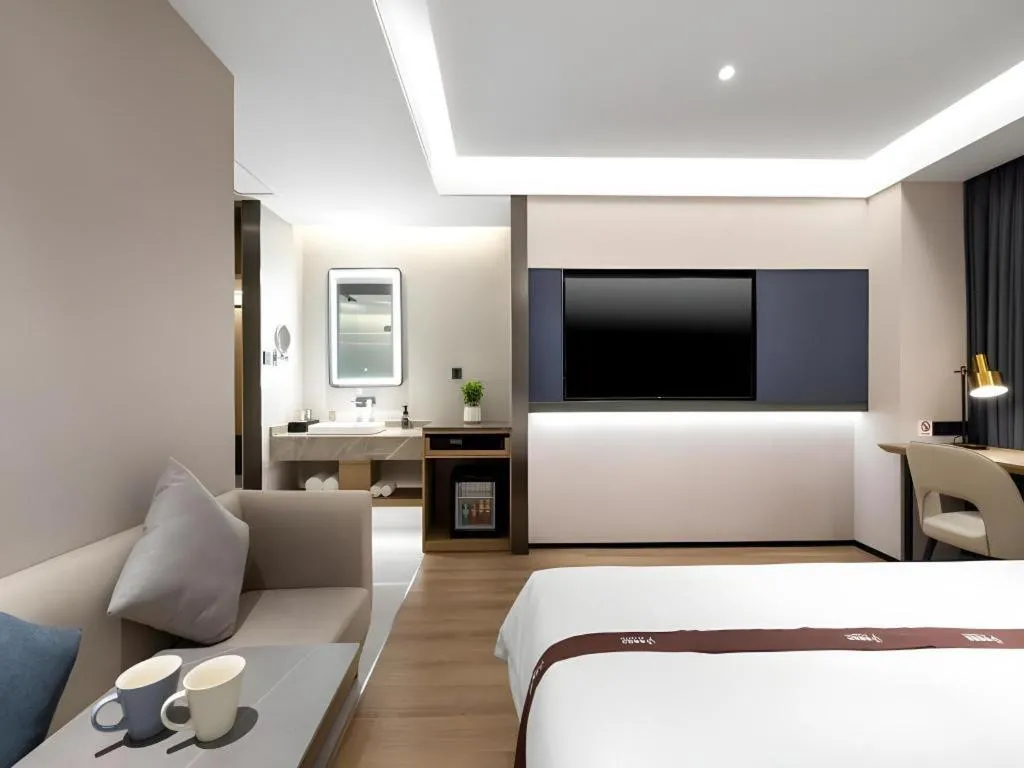 Bed in GYA Hotel Taiyuan Jinyang Street Grand Shanxi Hospital