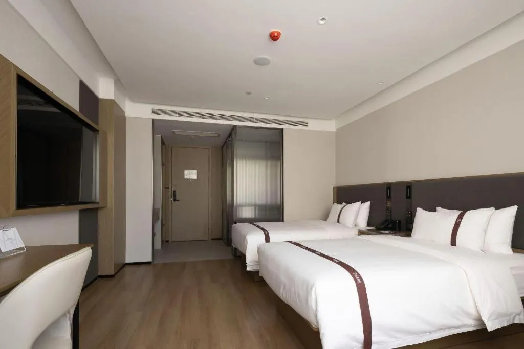Bed in GYA Hotel Taiyuan Jinyang Street Grand Shanxi Hospital