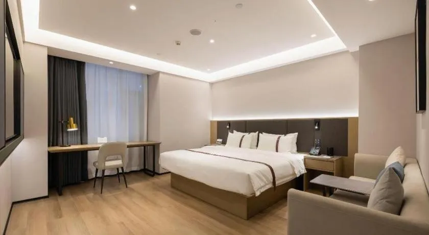 Bed in GYA Hotel Taiyuan Jinyang Street Grand Shanxi Hospital