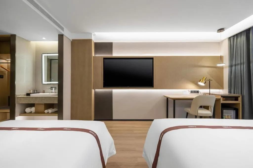 Bed in GYA Hotel Taiyuan Jinyang Street Grand Shanxi Hospital