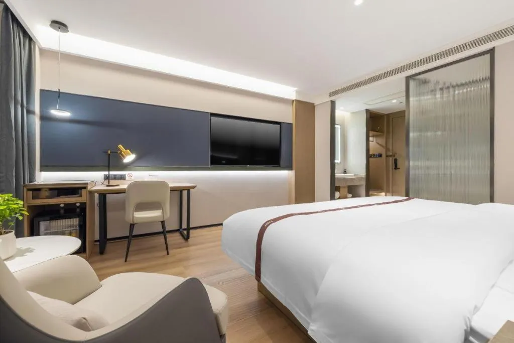 Bed in GYA Hotel Taiyuan Jinyang Street Grand Shanxi Hospital