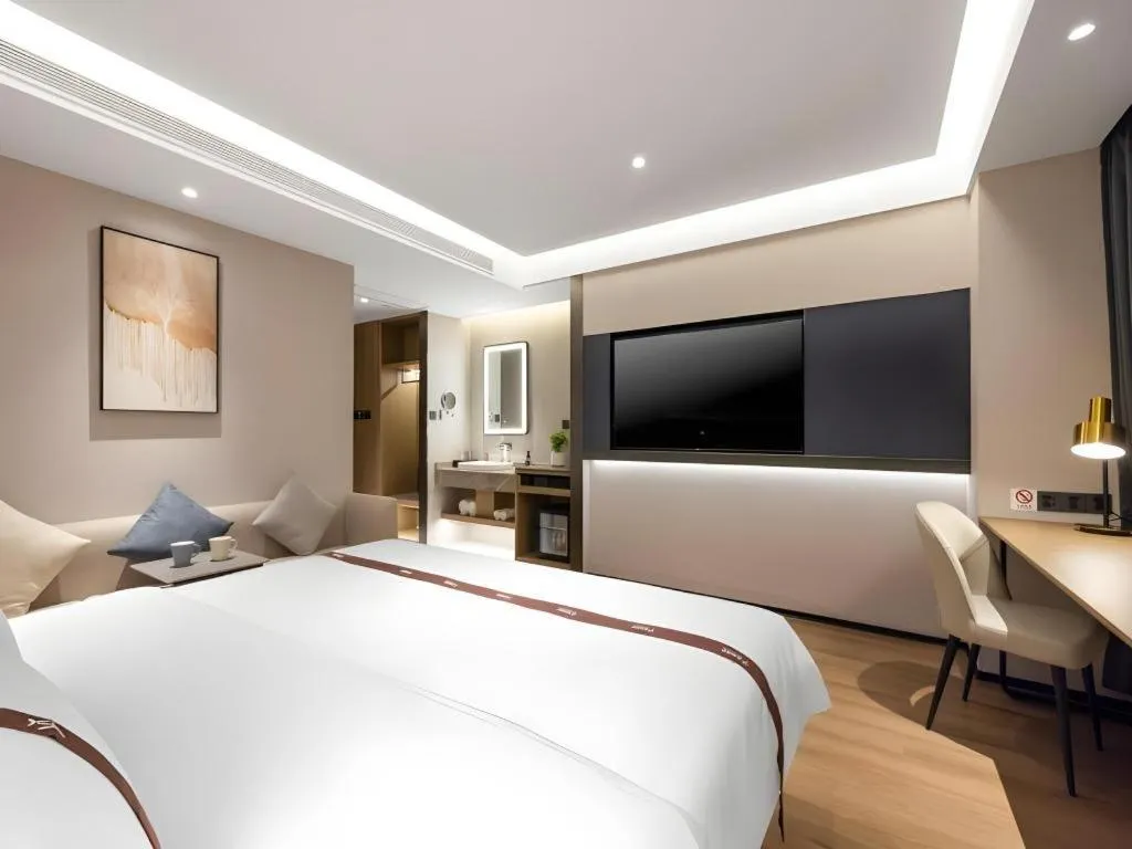 Bed in GYA Hotel Taiyuan Jinyang Street Grand Shanxi Hospital