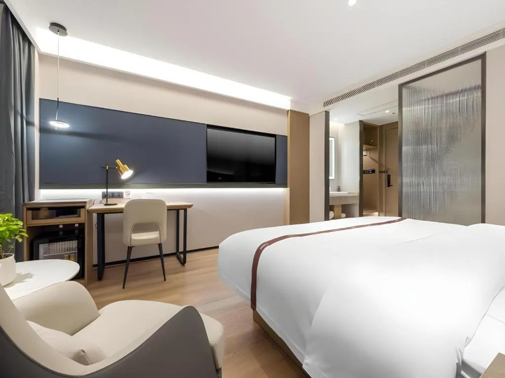 Bed in GYA Hotel Taiyuan Jinyang Street Grand Shanxi Hospital