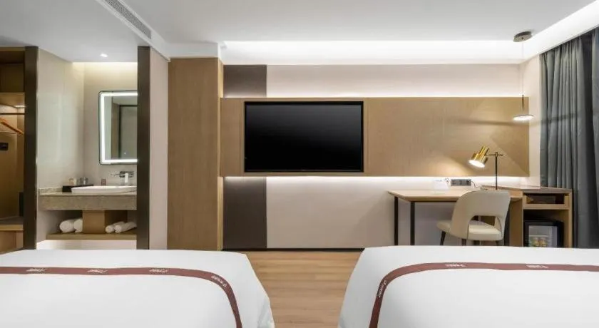 Bed in GYA Hotel Taiyuan Jinyang Street Grand Shanxi Hospital