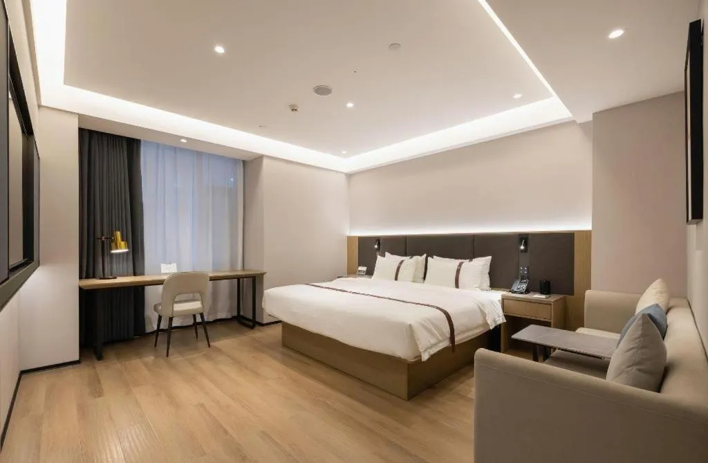 Bed in GYA Hotel Taiyuan Jinyang Street Grand Shanxi Hospital