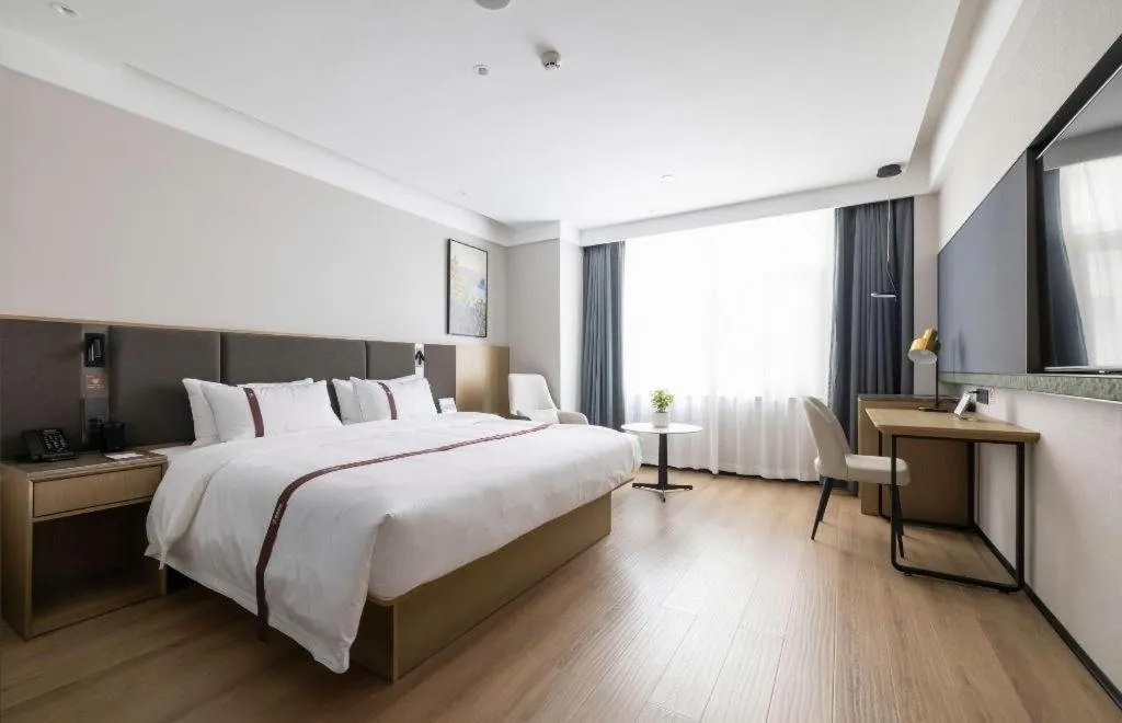 Bed in GYA Hotel Taiyuan Jinyang Street Grand Shanxi Hospital