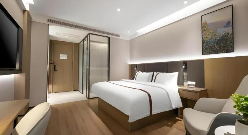 Bed in GYA Hotel Taiyuan Jinyang Street Grand Shanxi Hospital
