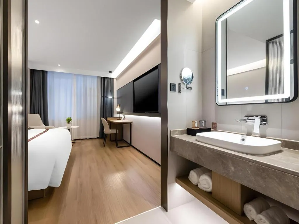 Bed in GYA Hotel Taiyuan Jinyang Street Grand Shanxi Hospital