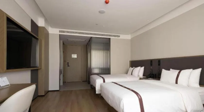 Bed in GYA Hotel Taiyuan Jinyang Street Grand Shanxi Hospital