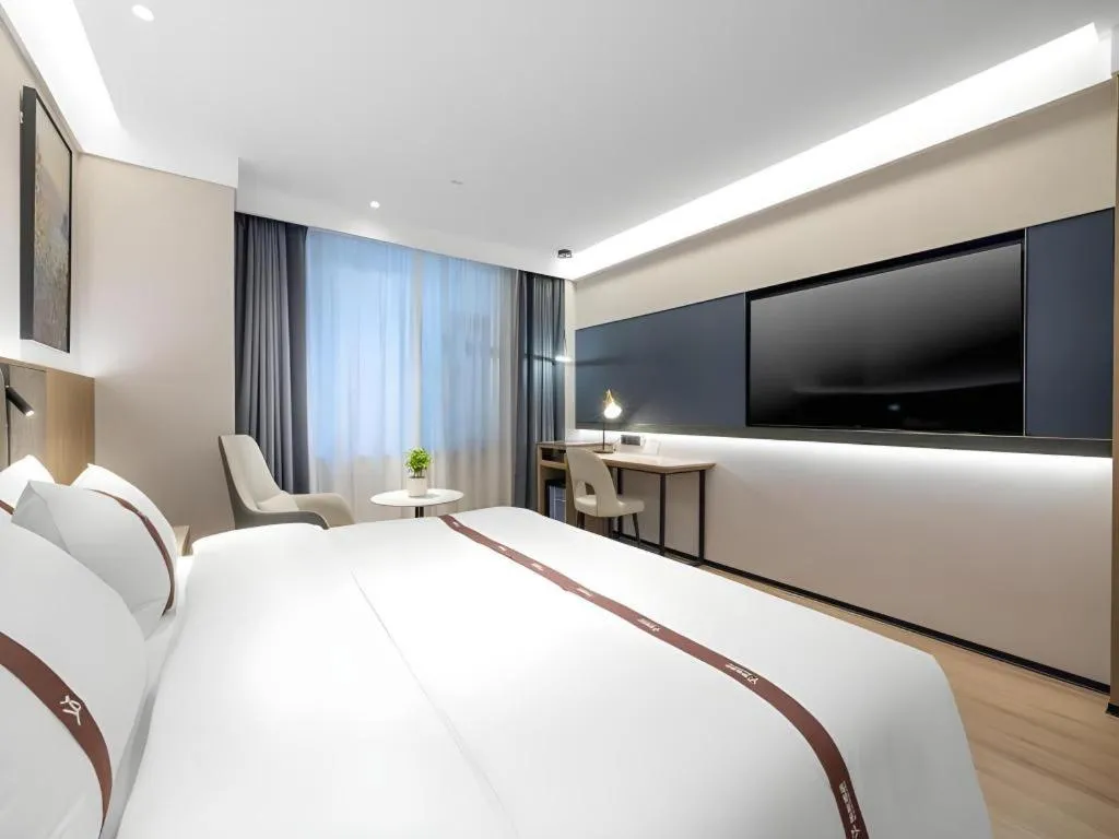 Bed in GYA Hotel Taiyuan Jinyang Street Grand Shanxi Hospital