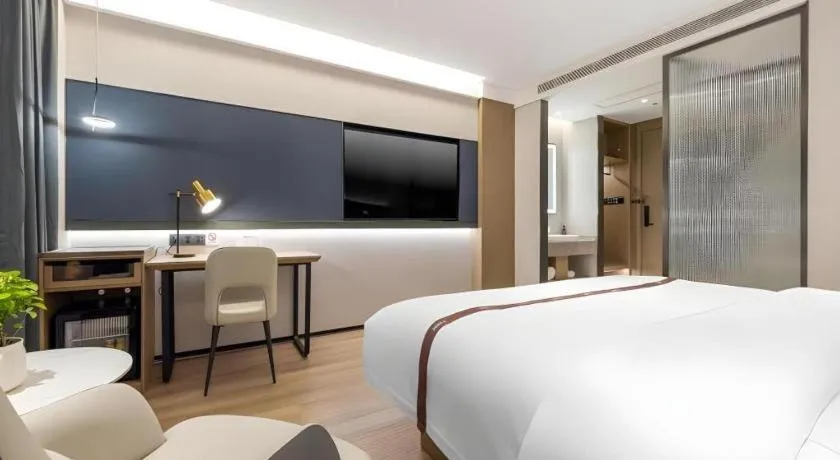 Bed in GYA Hotel Taiyuan Jinyang Street Grand Shanxi Hospital