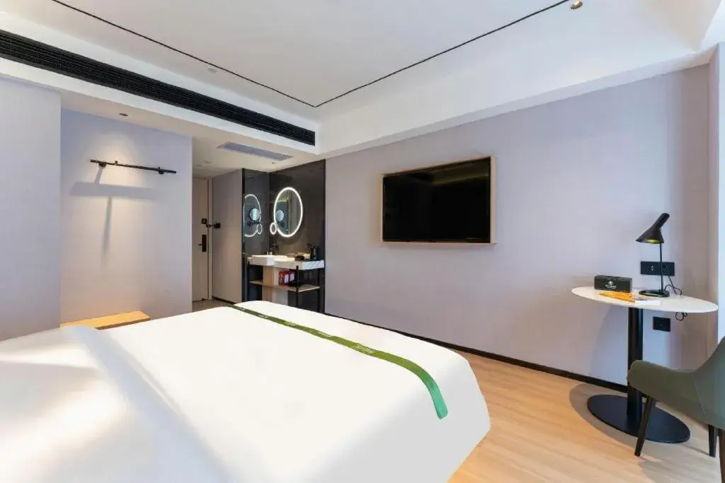 Bed in GreenTree Inn Jinan West Station Exhibition Center Bed in GreenTree Inn Jinan West Station Exhibition Center