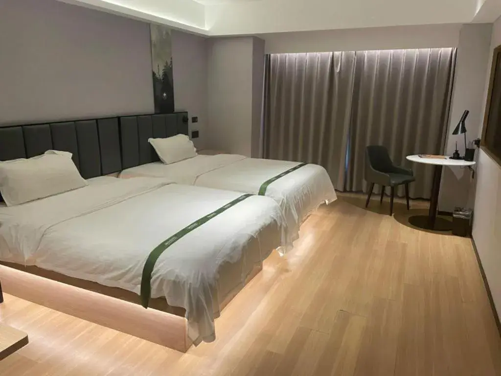 Bed in GreenTree Inn Jinan West Station Exhibition Center Bed in GreenTree Inn Jinan West Station Exhibition Center