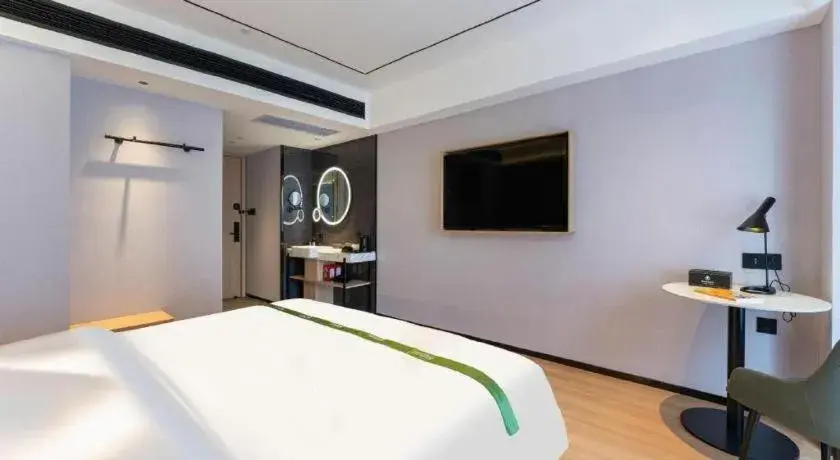 Bed in GreenTree Inn Jinan West Station Exhibition Center Bed in GreenTree Inn Jinan West Station Exhibition Center