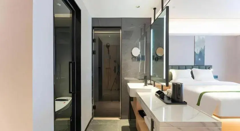 Bed in GreenTree Inn Jinan West Station Exhibition Center Bed in GreenTree Inn Jinan West Station Exhibition Center