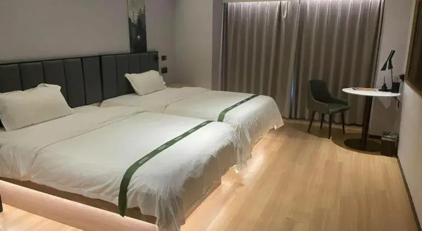 Bed in GreenTree Inn Jinan West Station Exhibition Center Bed in GreenTree Inn Jinan West Station Exhibition Center