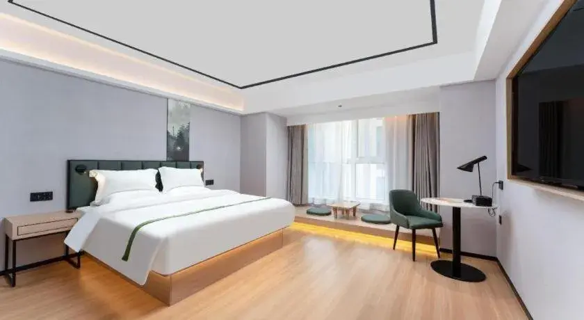 Bed in GreenTree Inn Jinan West Station Exhibition Center Bed in GreenTree Inn Jinan West Station Exhibition Center
