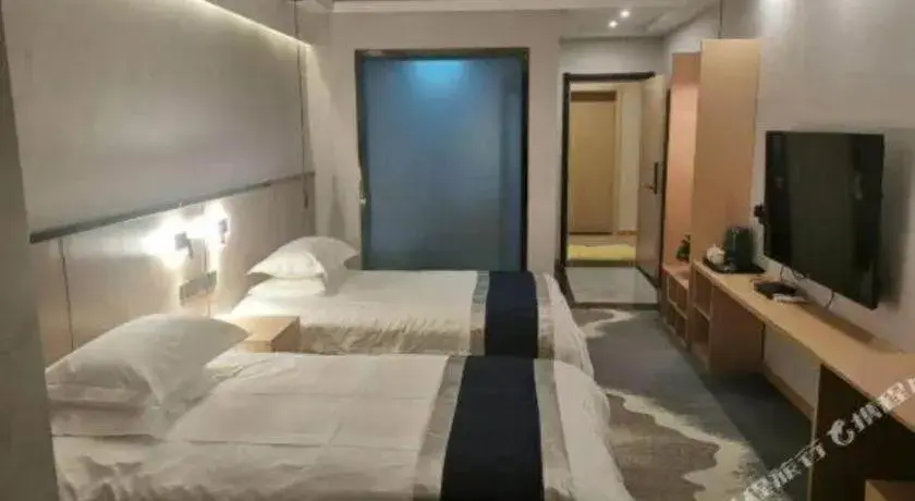 Bed in GELI Hotel Huainan Railway Station Sports Center Bed in GELI Hotel Huainan Railway Station Sports Center