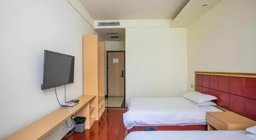 Bed in GELI Hotel Huainan Railway Station Sports Center